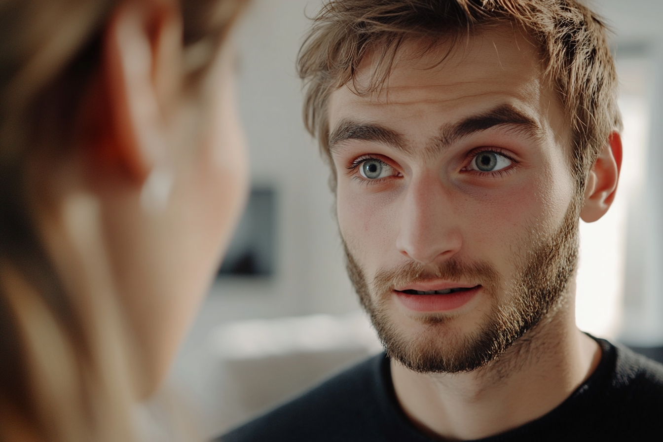 Un hombre hablando con una mujer | Fuente: Midjourney