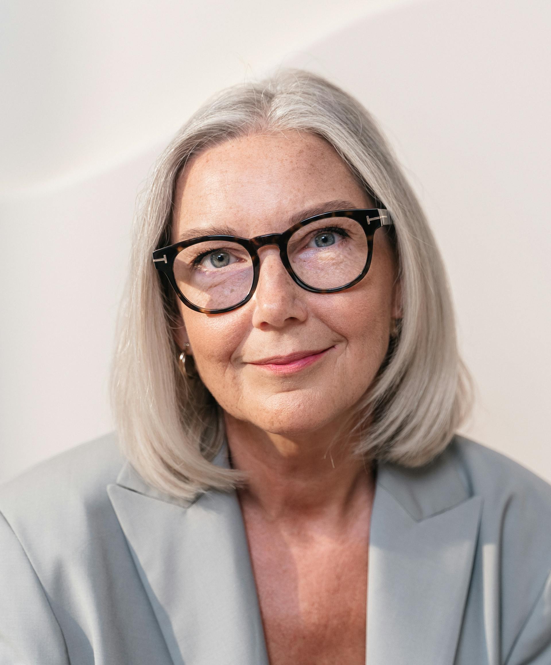 Una mujer sonriente | Fuente: Pexels