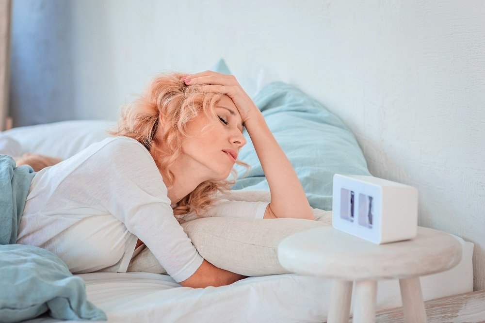 Mujer sin poder dormir. Fuente: Shutterstock