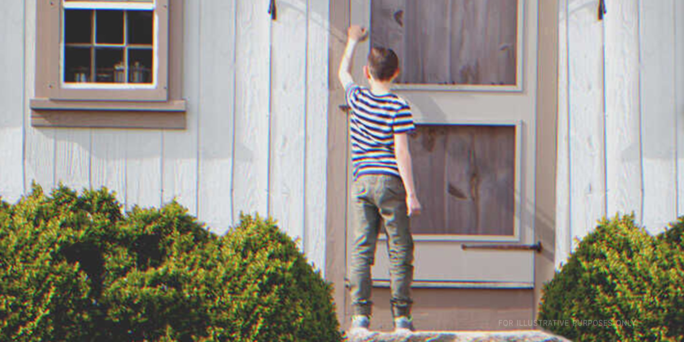 Un niño llamando a una puerta | Foto: Shutterstock
