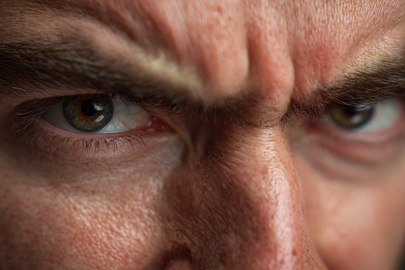 Primer plano de los ojos de un hombre | Fuente: Midjourney