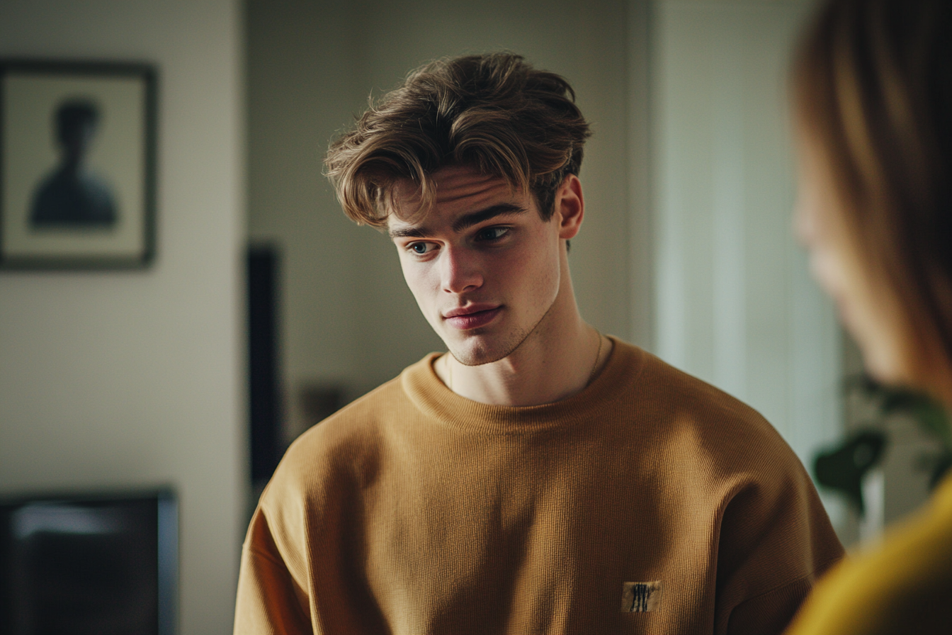 Un joven hablando con su madre | Fuente: Midjourney