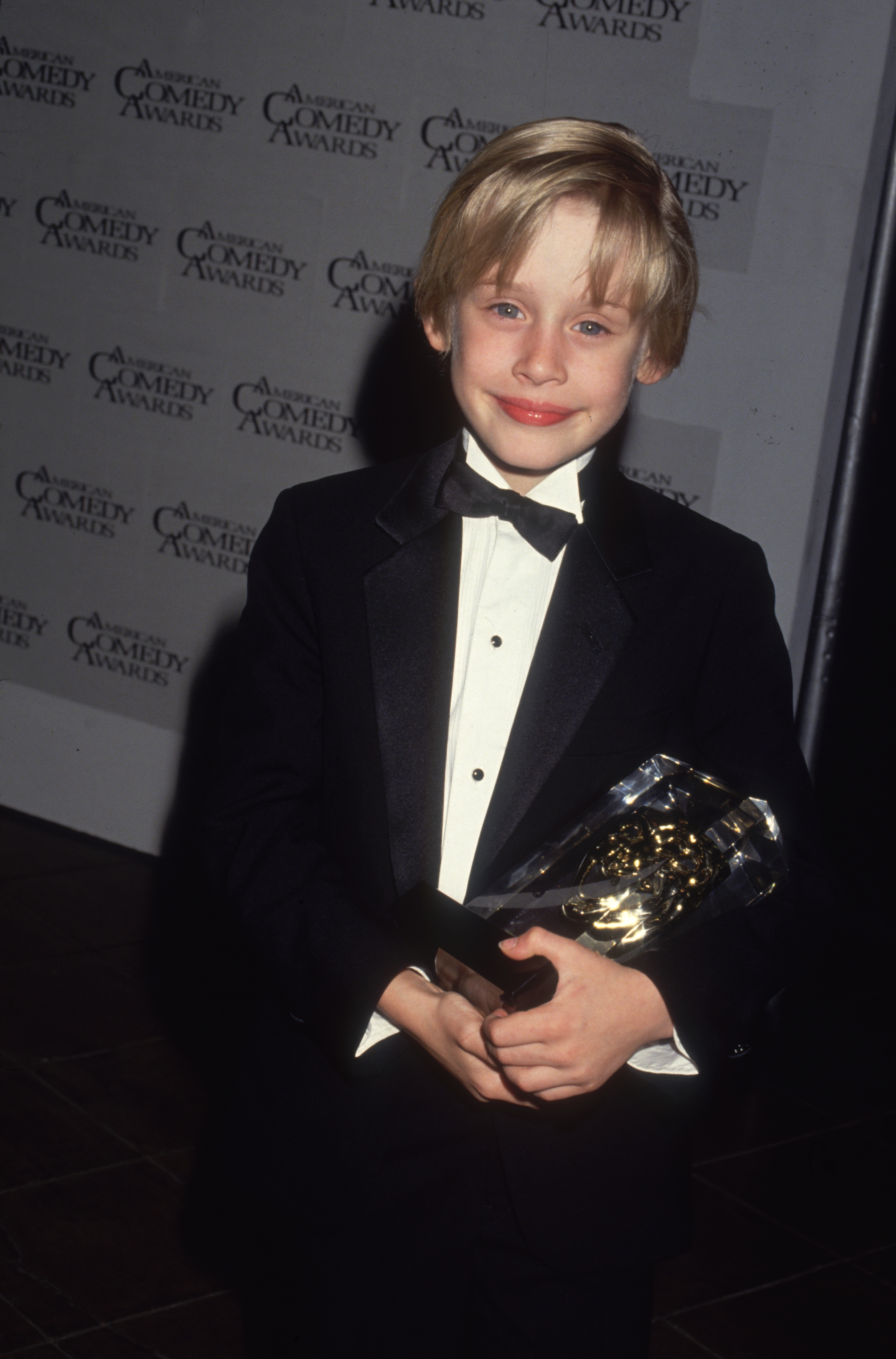 Macaulay Culkin en los Premios de la Comedia Americana en 1991 | Foto: Getty Images