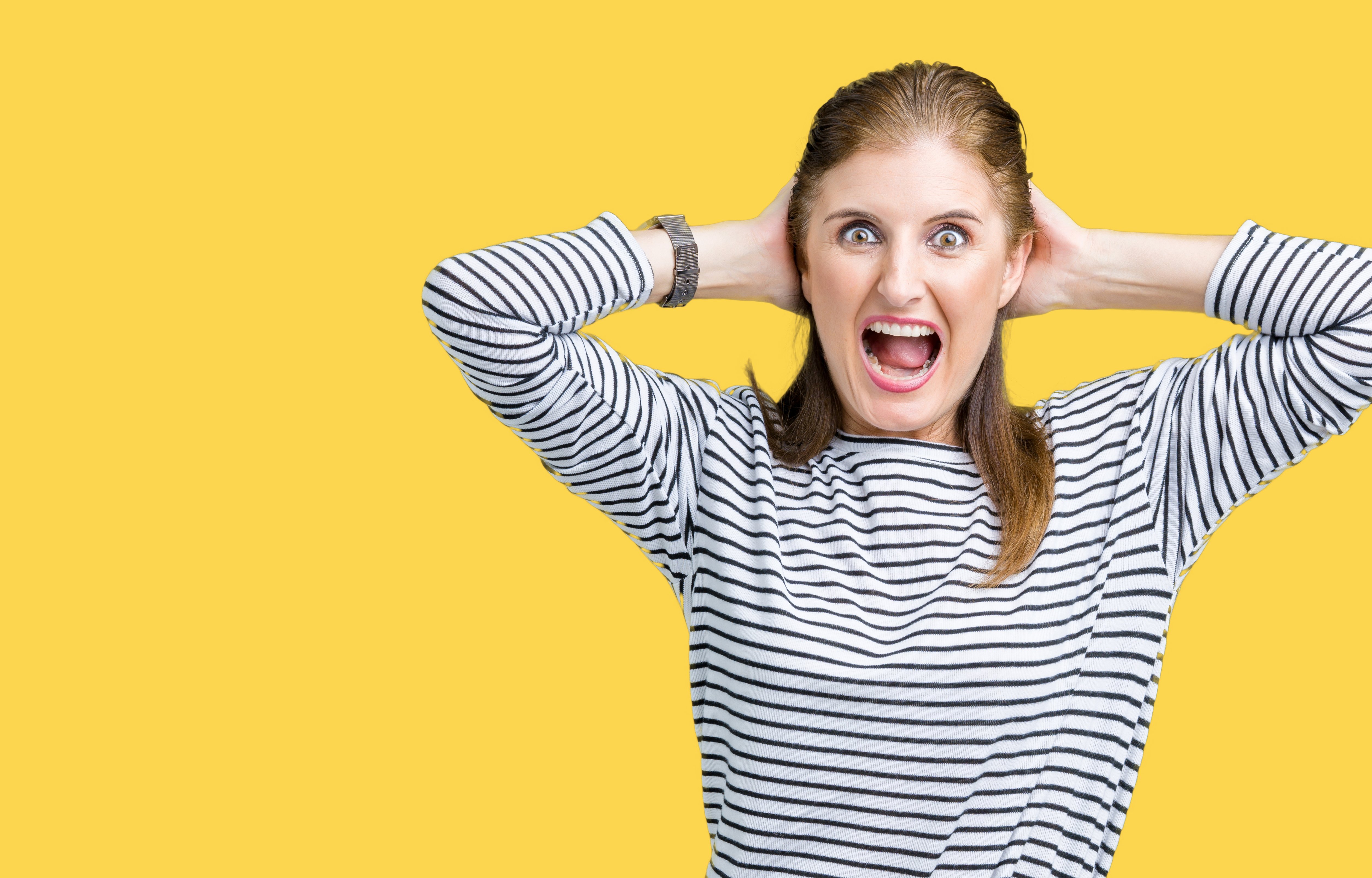Mujer gritando. Fuente: Shutterstock