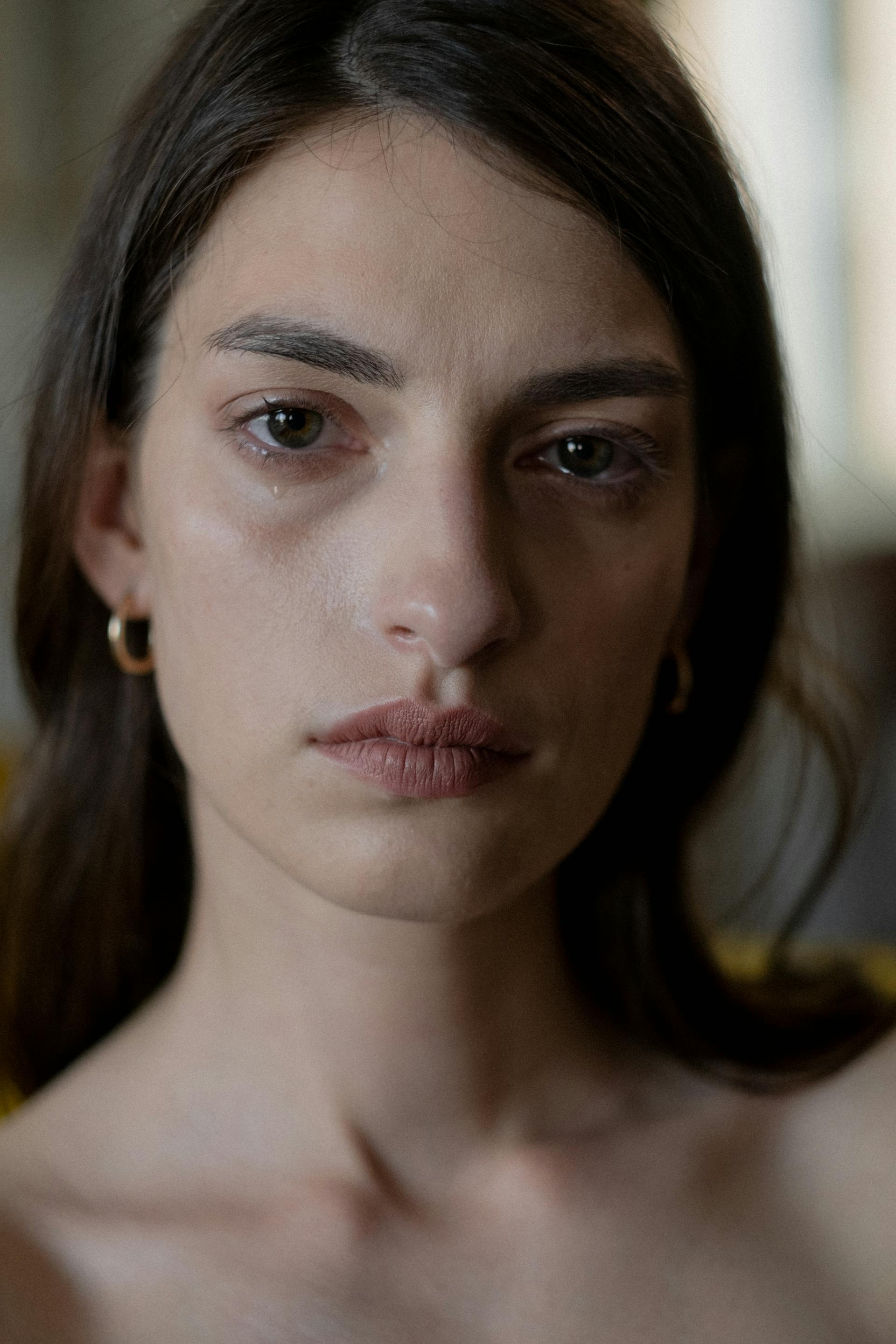 Una mujer con lágrimas en los ojos | Fuente: Pexels
