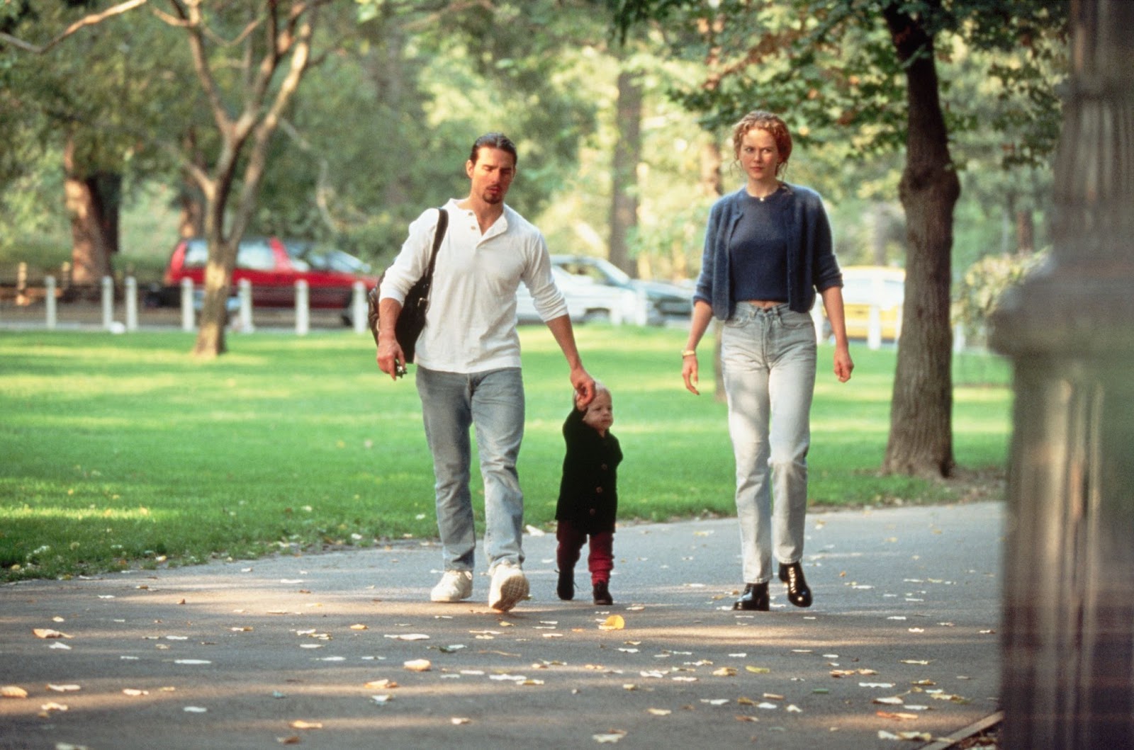 Tom Cruise y Nicole Kidman con su hija en Central Park, Nueva York, en 1994 | Fuente: Getty Images