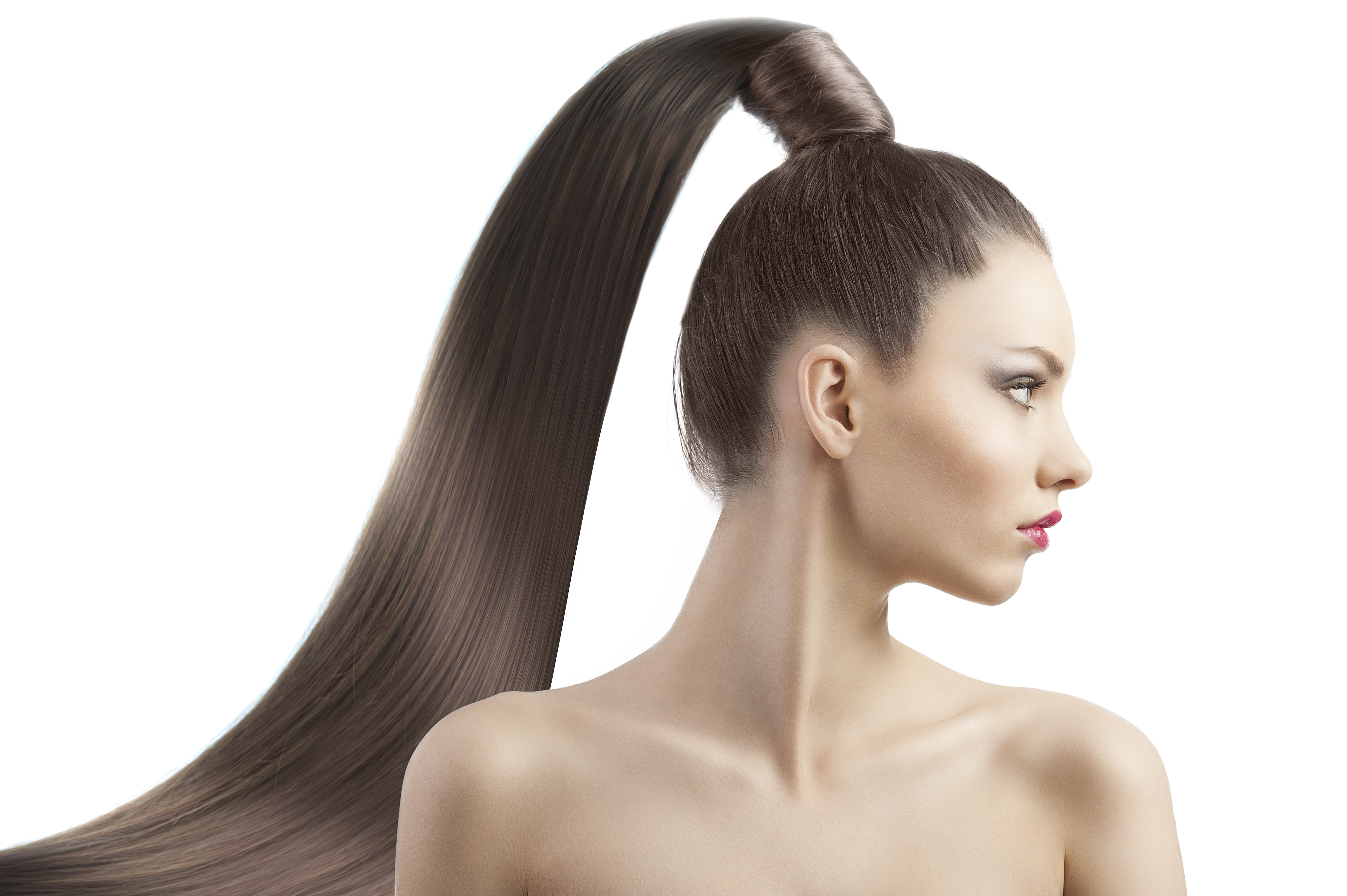Una mujer con el pelo larguísimo recogido en una coleta | Foto: Shutterstock