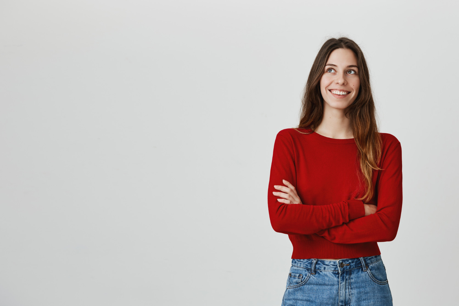 Una mujer sonriendo | Fuente: Freepik