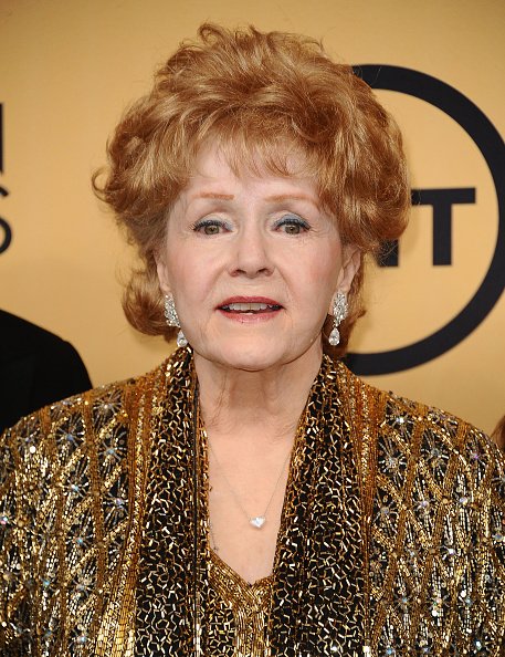 Debbie Reynolds en el Shrine Auditorium el 25 de enero de 2015 en Los Ángeles, California. | Foto: Getty Images.