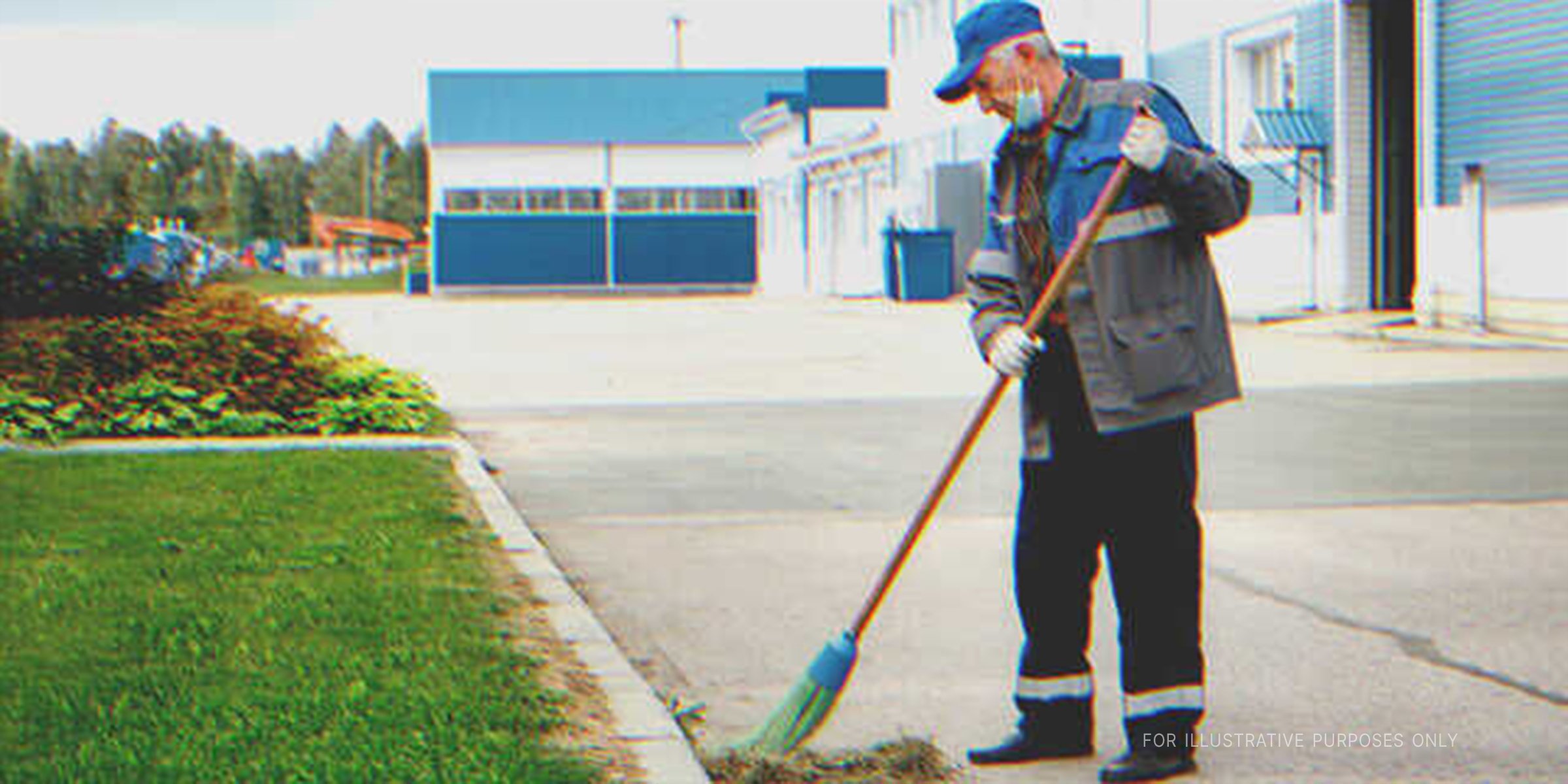 Elderly janitor sweeping outside an office | Source: Shutterstock
