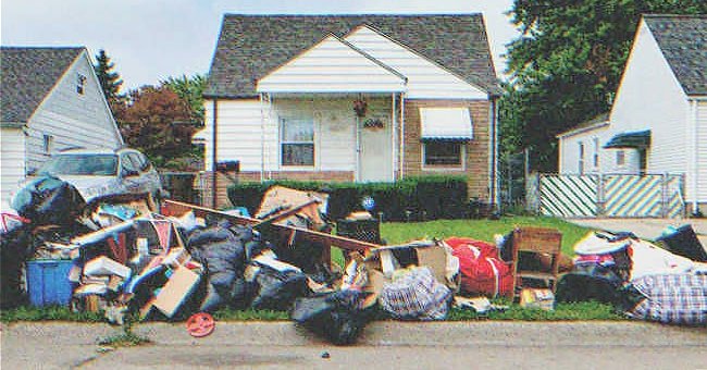 Basura frente a una casa | Fuente: Shutterstock